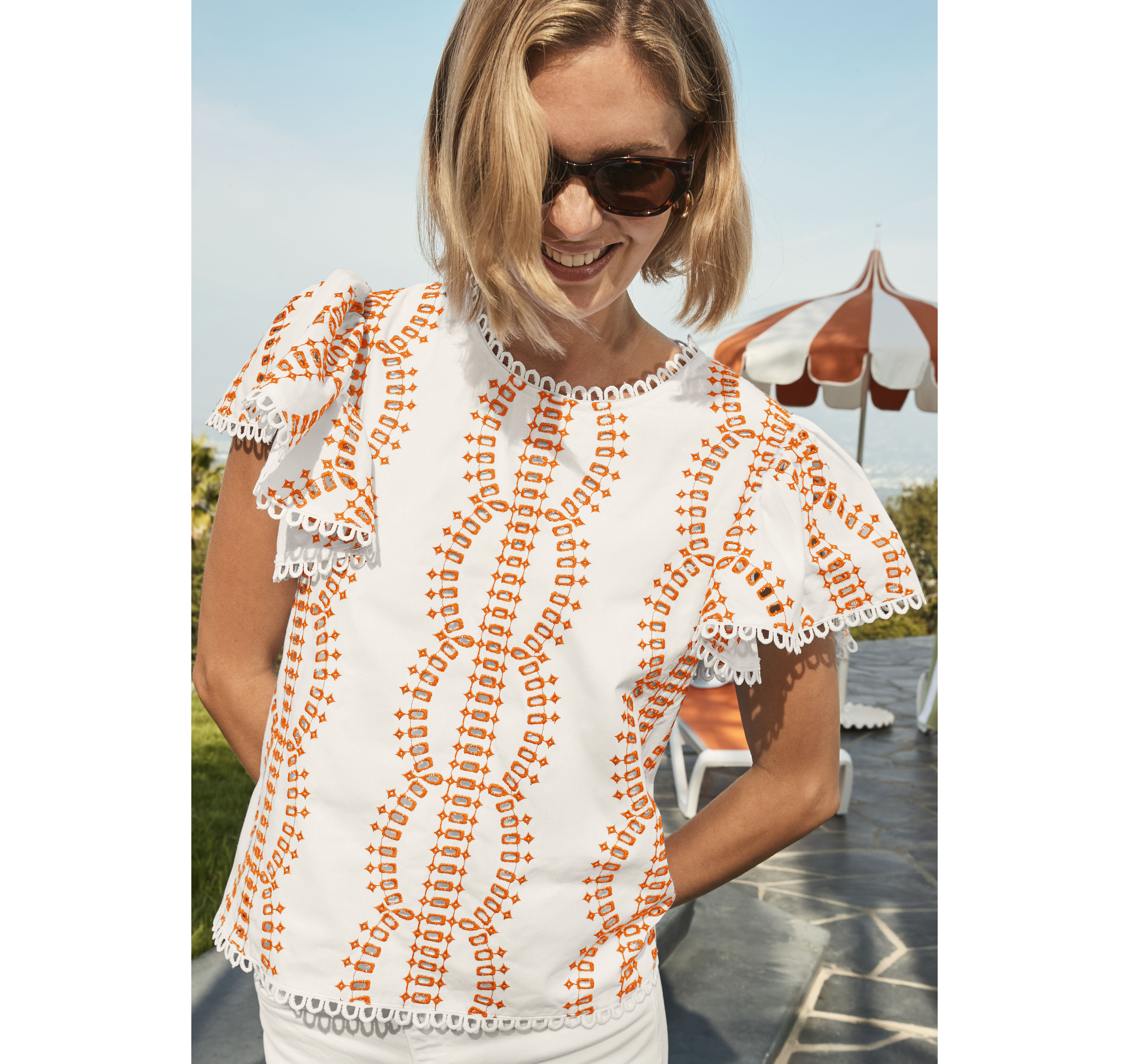 Game Day Eyelet Flutter Sleeve Top