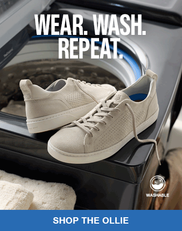 A pair of Johnston & Murphy men's casual sneakers sitting on the washer and then flips to a hand putting the shoes into the washer.