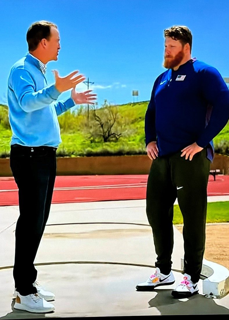Peyton Manning wearing Johnston & Murphy at the Paris Olympics