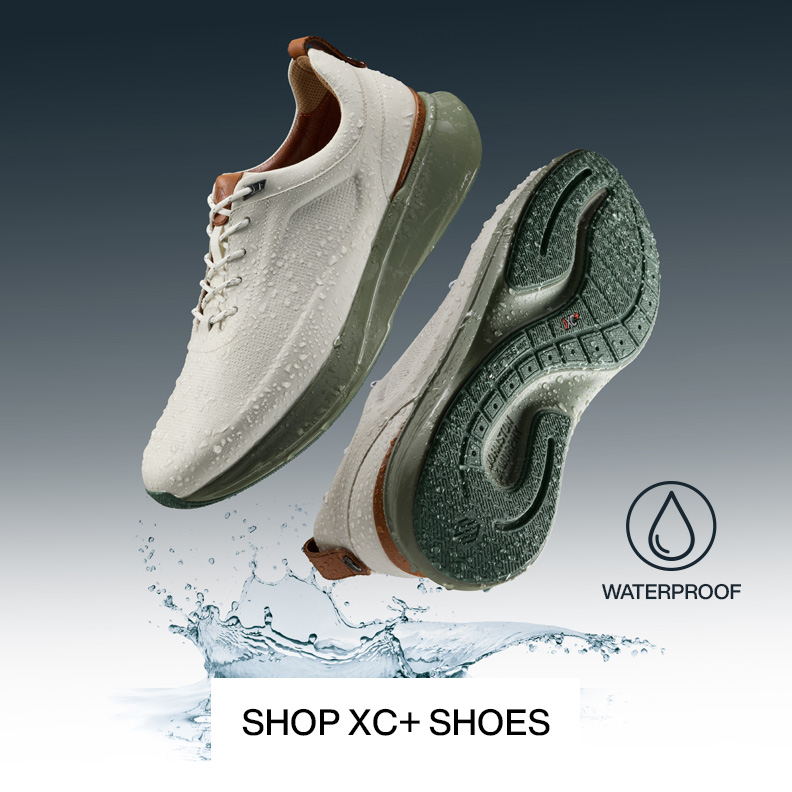 Flatlay of two men's sneakers covered in rain drops to showcase that they are waterproof.