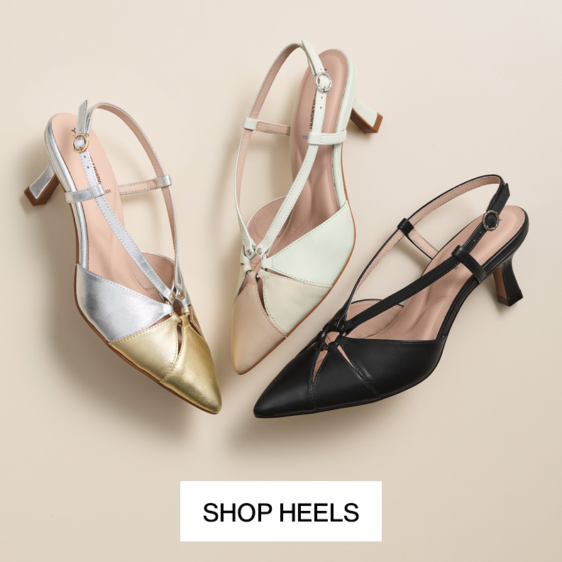 Two womens platform loafers One in black and one in silver metallic.