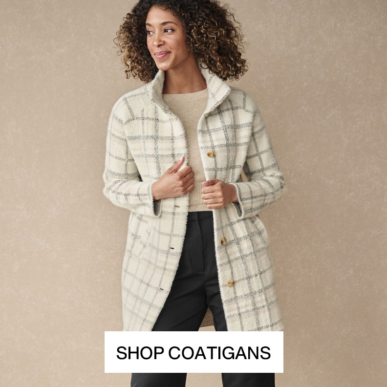 Woman wearing a cream plaid coatigan with front pockets and gold-tone buttons.