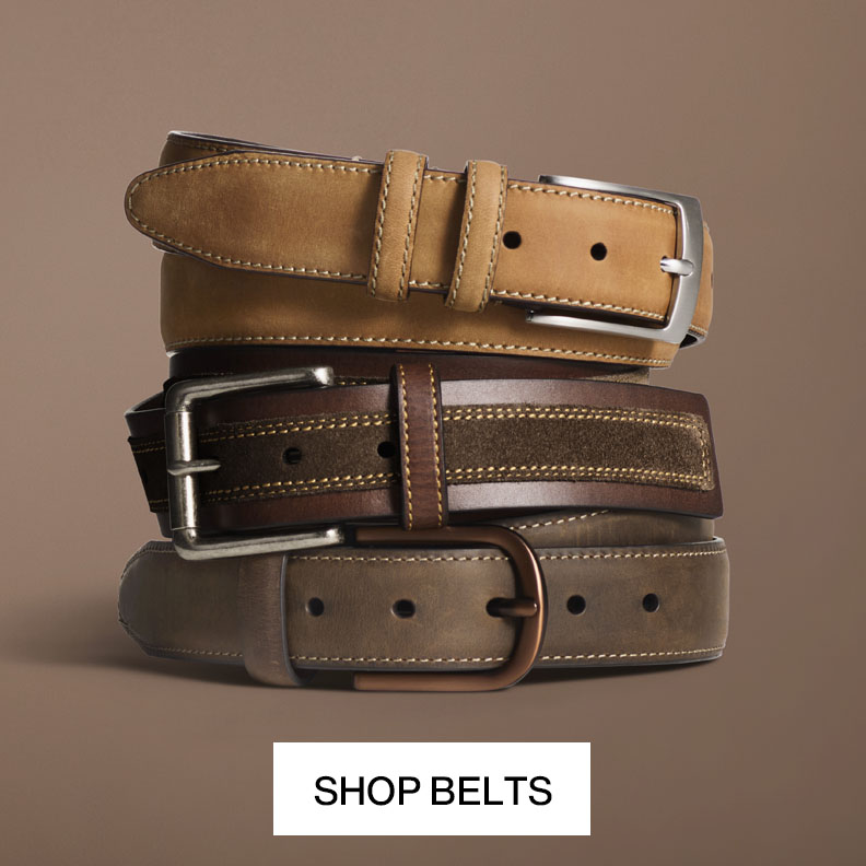 Stack of men's leather belts in brown and black with various buckle styles with text that reads shop belts.